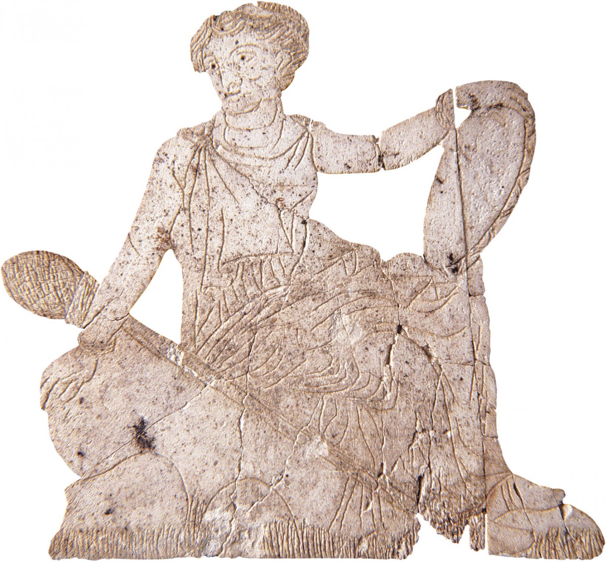 Ελεφαντοστέινο πλακίδιο από διακόσμηση νεκρικής κλίνης που εικονίζει Μαινάδα, 325-300 π.Χ. Από τάφο της Μεθώνης. Εφορεία Αρχαιοτήτων Πιερίας. Photo © ΥΠΠΟΑ.