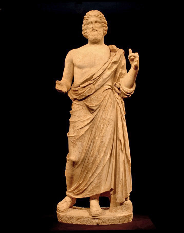 Εικ. 2. Άγαλμα του θεού Ασκληπιού, 2ος αι. π.Χ., Εμπόριον. Πηγή εικόνας: Camp d’Aprenentatge Empúries.