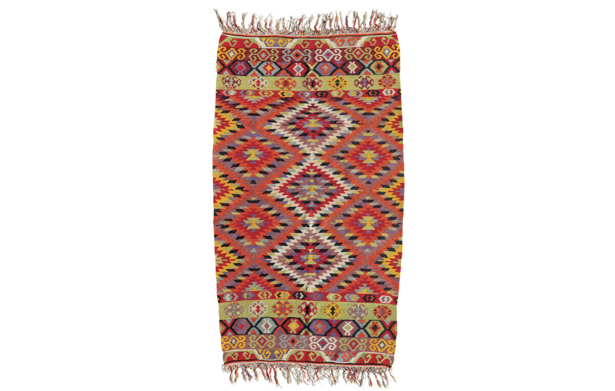 Κιλίμι. Ήλιος. Περίπου 1895. Υφασμένο από την Ελένη Νικολάου Γεωργίου Σκουλαρίνα (γ. 1880–;). Συλλογή Ελένης Μανούση, Γεράκι. Φωτ.: Αφροδίτη Βουλγαράκη.